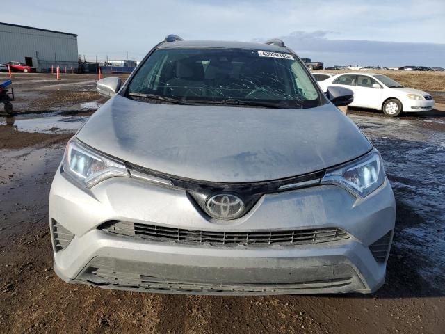 Photo 5 from auction – 2018 TOYOTA RAV4 LE with VIN 2T3BFREV5JW829207