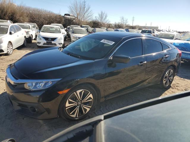 HONDA CIVIC EX 2018 with VIN JHMFC1F38JX011764 - Photo from auction