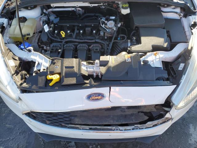Foto 11 de la subasta – 2017 FORD FOCUS SE con VIN 1FADP3K20HL278765