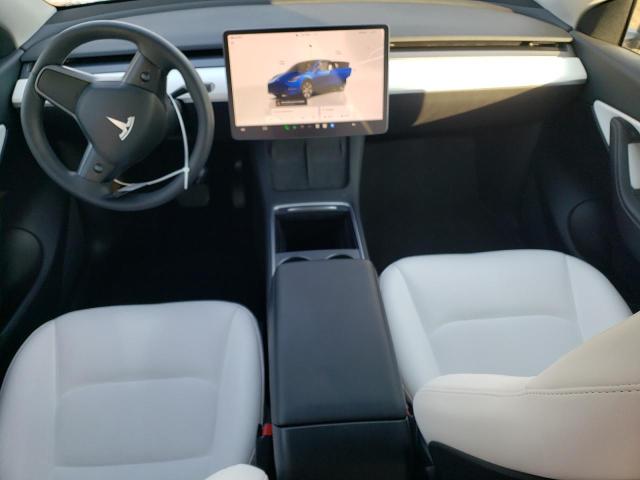 Photo 8 from auction – 2022 TESLA MODEL Y with VIN 7SAYGDEE2NF505558