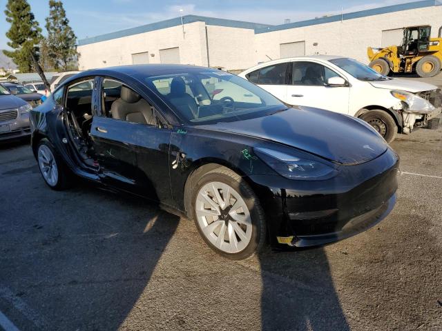 Photo 4 from auction – 2022 TESLA MODEL 3 with VIN 5YJ3E1EB9NF131421