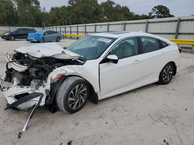 Photo 1 from auction – 2018 HONDA CIVIC EX with VIN 19XFC2F70JE010408