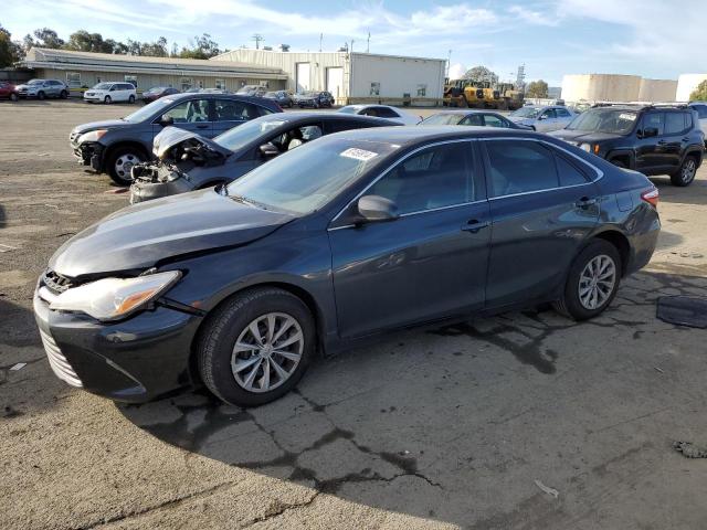 TOYOTA CAMRY LE 2017 with VIN 4T1BF1FKXHU371544 - Photo from auction