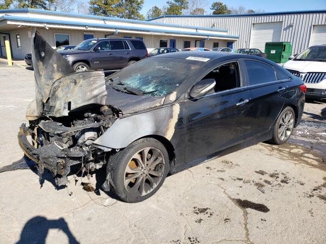 HYUNDAI SONATA 2014 with VIN 5NPEC4AB7EH811261 - Photo from auction