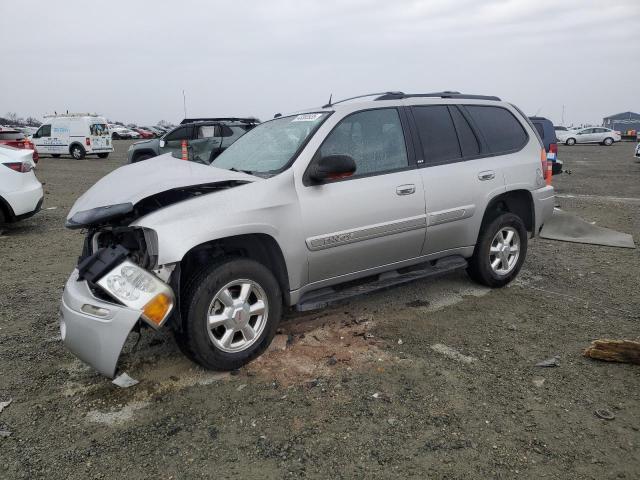 GMC ENVOY 2004 with VIN 1GKDS13S142358446 - Photo from auction