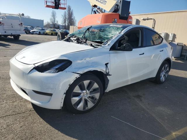TESLA MODEL Y 2024 with VIN 7SAYGDED9RF058014 - Photo from auction