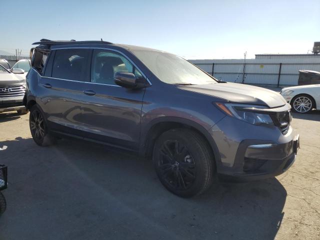 Photo 4 from auction – 2022 HONDA PILOT SE with VIN 5FNYF5H2XNB028191