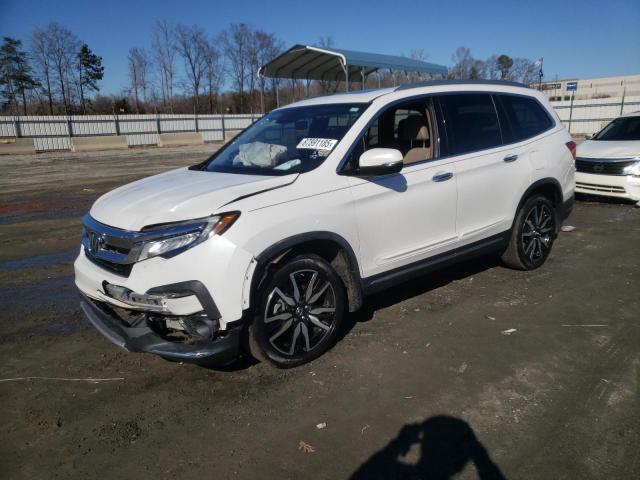Photo 1 from auction – 2021 HONDA PILOT TOUR with VIN 5FNYF5H94MB001855