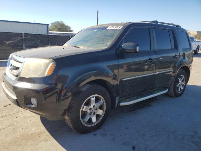 HONDA PILOT TOUR 2010 with VIN 5FNYF3H82AB008505 - Photo from auction