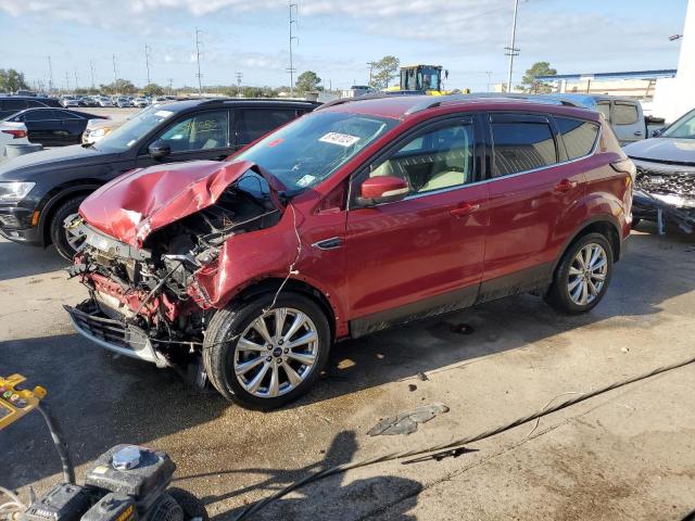 FORD ESCAPE TIT 2017 with VIN 1FMCU0J90HUA57779 - Photo from auction