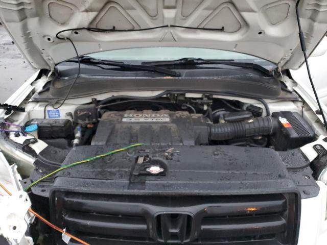 Photo 12 from auction – 2006 HONDA PILOT EX with VIN 2HKYF18766H525097