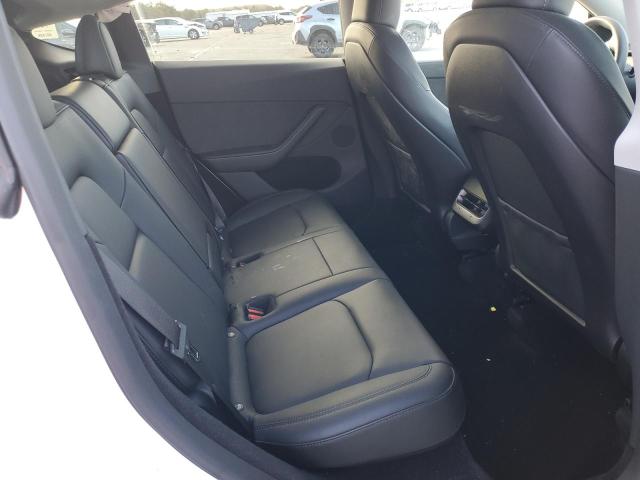 Photo 11 from auction – 2023 TESLA MODEL Y with VIN 7SAYGDEE6PA125140