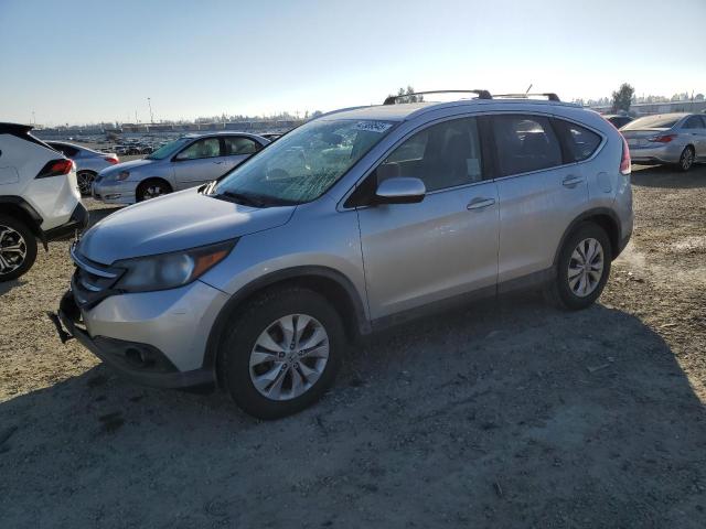 HONDA CR-V EX 2012 with VIN JHLRM4H54CC028697 - Photo from auction
