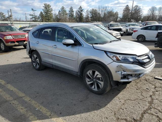 Photo 4 from auction – 2016 HONDA CRV with VIN 5J6RM4H97GL033151