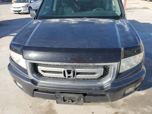 Photo 12 from auction – 2010 HONDA RIDGELINE with VIN 5FPYK1F51AB002145