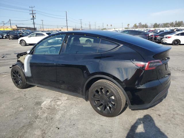 Photo 2 from auction – 2023 TESLA MODEL Y with VIN 7SAYGDEE2PA050565