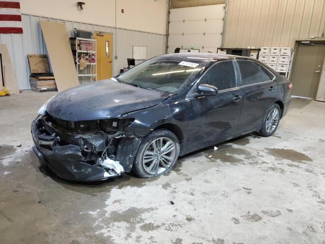 TOYOTA CAMRY LE 2017 with VIN 4T1BF1FK2HU676262 - Photo from auction