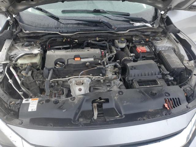 Photo 11 from auction – 2018 HONDA CIVIC LX with VIN 19XFC2F53JE042610