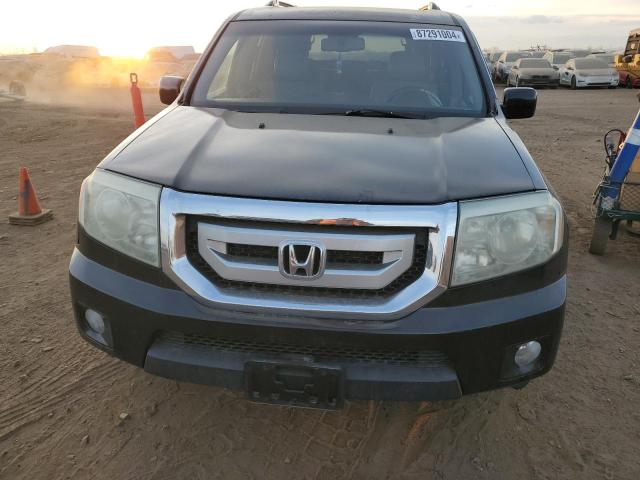 Photo 5 from auction – 2009 HONDA PILOT EXL with VIN 5FNYF48509B050694