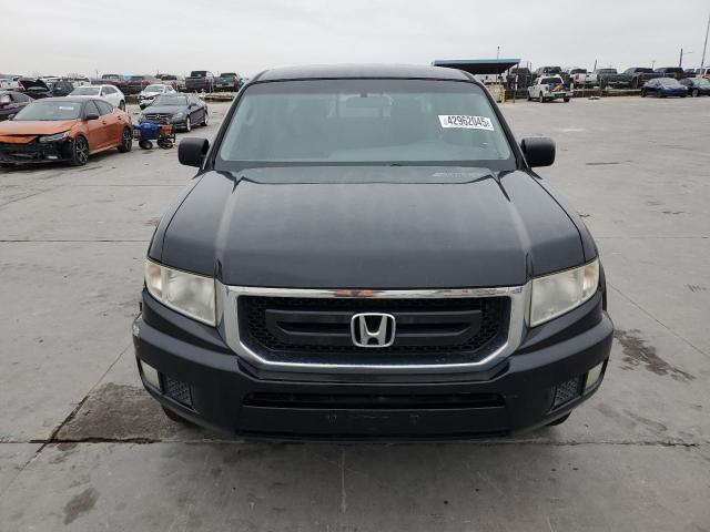 Photo 5 from auction – 2011 HONDA RIDGELINE with VIN 5FPYK1F21BB009541