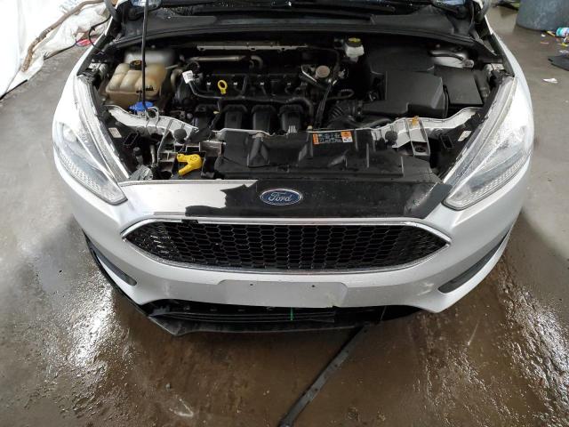 Photo 11 from auction – 2018 FORD FOCUS S with VIN 1FADP3E22JL258289