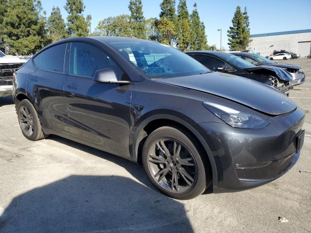 Photo 4 from auction – 2025 TESLA MODEL Y with VIN 7SAYGDEE5SF242588