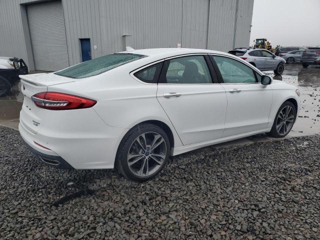Photo 3 from auction – 2019 FORD FUSION TIT with VIN 3FA6P0D94KR226498