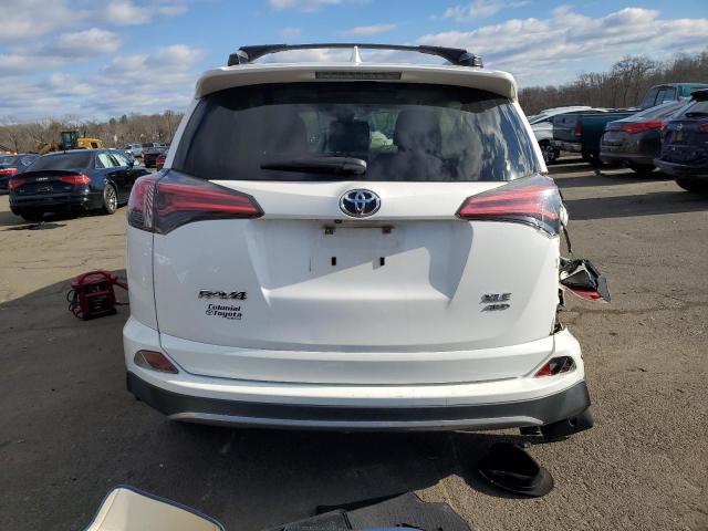 Photo 6 from auction – 2017 TOYOTA RAV4 XLE with VIN JTMRFREV4HD216081