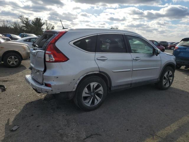 Photo 3 from auction – 2016 HONDA CRV with VIN 5J6RM4H97GL033151