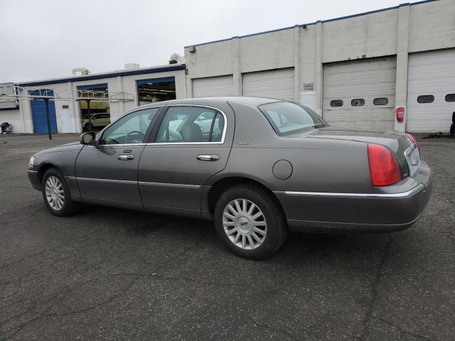 Photo 2 from auction – 2004 LINCOLN TOWN CAR E with VIN 1LNHM81W84Y667684
