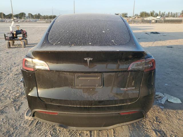 Photo 6 from auction – 2023 TESLA MODEL Y with VIN 7SAYGDEF9PF920226