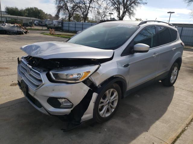 FORD ESCAPE SE 2018 with VIN 1FMCU0GDXJUA10549 - Photo from auction