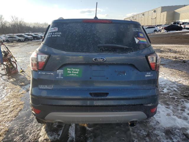 Photo 6 from auction – 2018 FORD ESCAPE SE with VIN 1FMCU9GD6JUA45979