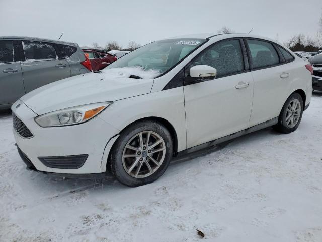 FORD FOCUS SE 2016 with VIN 1FADP3F28GL323024 - Photo from auction