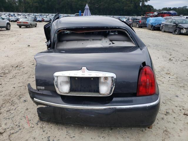 Photo 6 from auction – 2002 LINCOLN TOWN CAR E with VIN 1LNHM81WX2Y645781