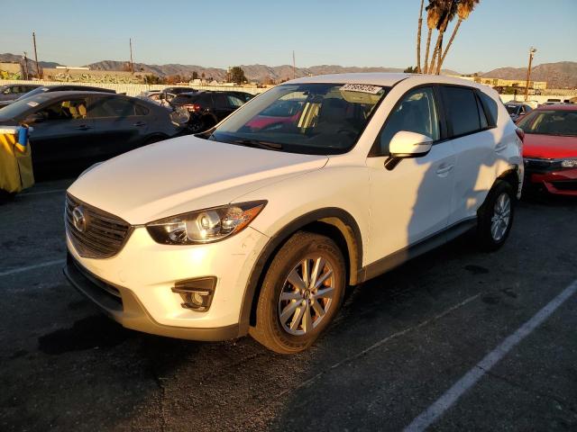 MAZDA CX-5 TOURI 2016 with VIN JM3KE2CY6G0684559 - Photo from auction