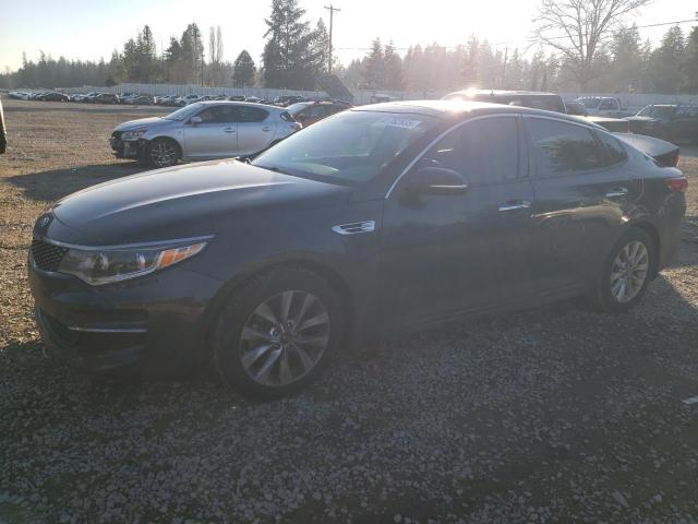 KIA OPTIMA EX 2016 with VIN 5XXGU4L32GG100920 - Photo from auction