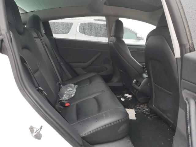 Photo 11 from auction – 2021 TESLA MODEL 3 with VIN 5YJ3E1EB1MF938904