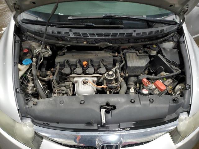 Photo 11 from auction – 2011 HONDA CIVIC LX with VIN 19XFA1F58BE031460