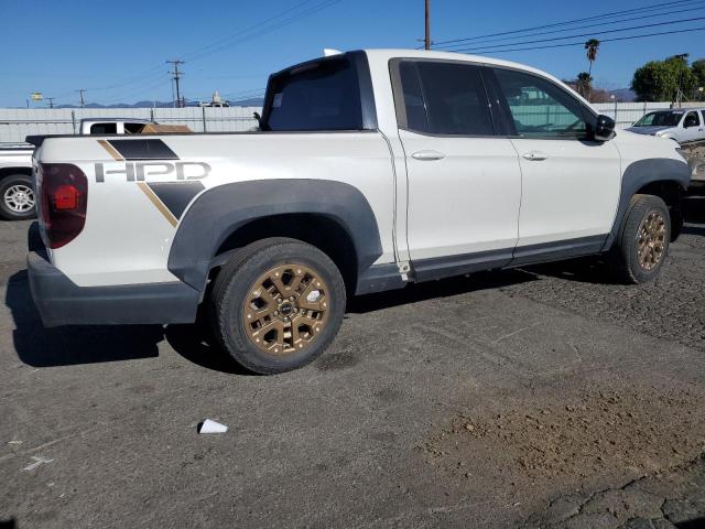 Photo 3 from auction – 2021 HONDA RIDGELINE with VIN 5FPYK3F15MB000167