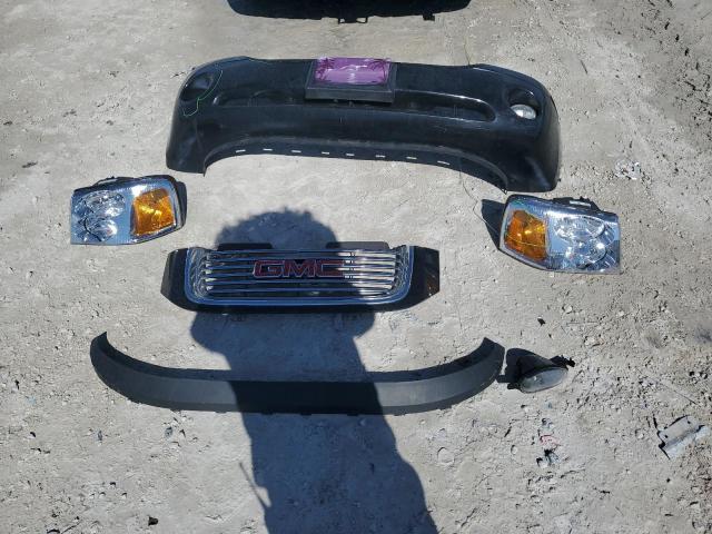 Photo 13 from auction – 2007 GMC ENVOY with VIN 1GKDS13S472107120