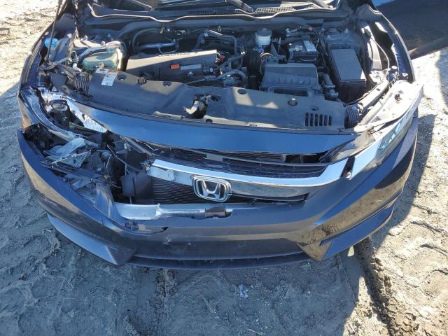 Photo 11 from auction – 2016 HONDA CIVIC LX with VIN 19XFC2F54GE071509