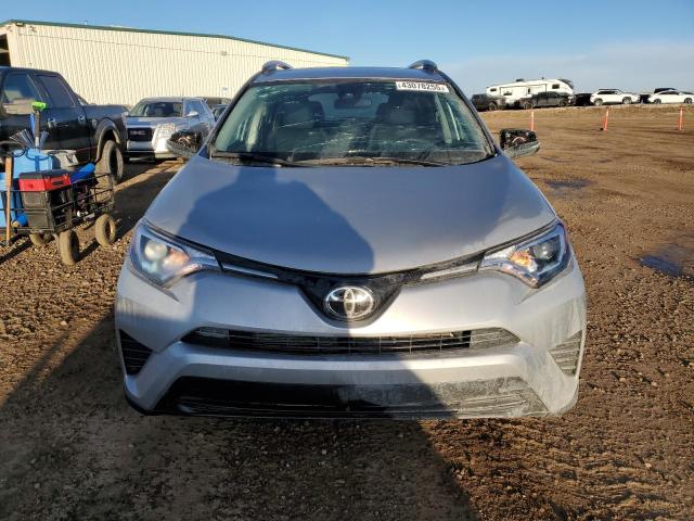 Photo 5 from auction – 2018 TOYOTA RAV4 LE with VIN 2T3BFREV9JW840730