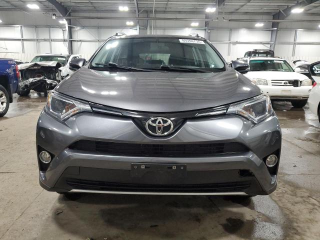 Photo 5 from auction – 2016 TOYOTA RAV4 XLE with VIN 2T3RFREV0GW513625