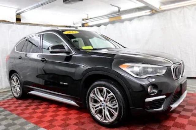 BMW X1 XDRIVE2 2017 with VIN WBXHT3Z36H4A52378 - Photo from auction
