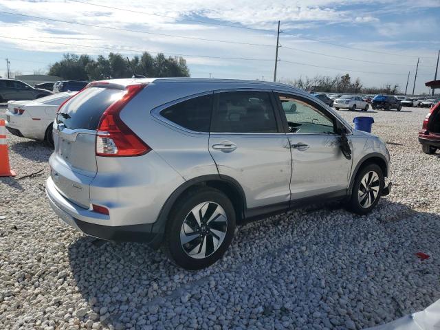 Photo 3 from auction – 2016 HONDA CR-V TOURI with VIN 5J6RM3H90GL011275