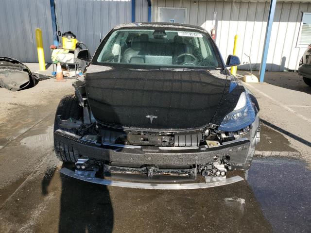 Photo 5 from auction – 2022 TESLA MODEL 3 with VIN 5YJ3E1EA0NF188873