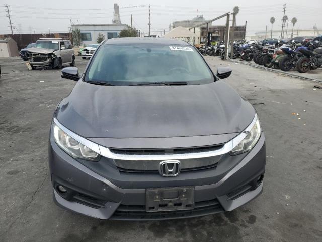 Photo 5 from auction – 2017 HONDA CIVIC EXL with VIN 2HGFC1F76HH656675