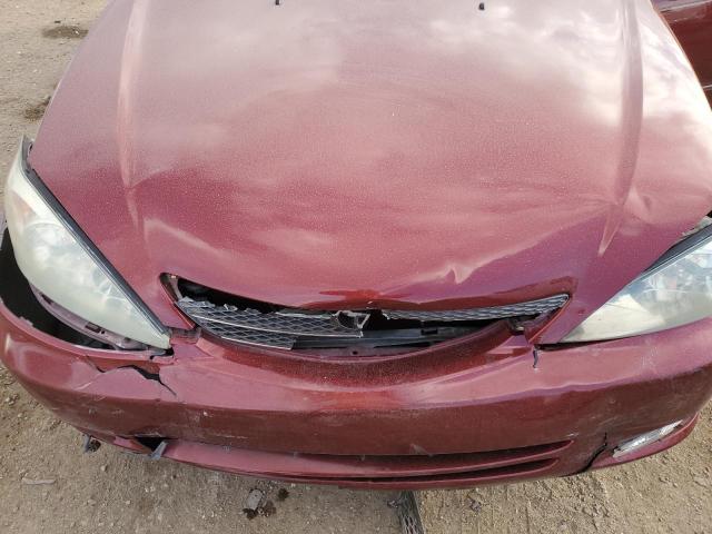 Photo 11 from auction – 2003 TOYOTA CAMRY LE with VIN 4T1BE30K33U249401