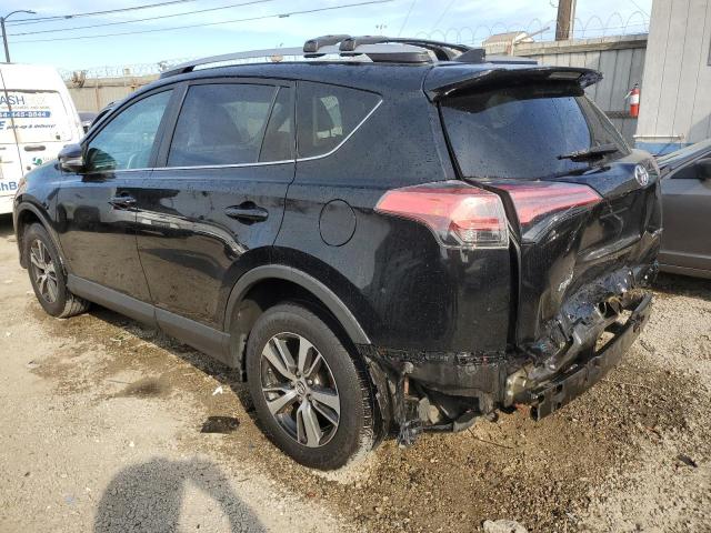 Photo 2 from auction – 2017 TOYOTA RAV4 XLE with VIN 2T3WFREV5HW369624
